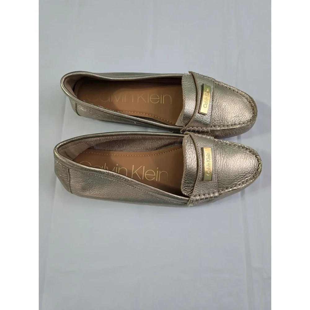 Calvin Klein Leta Metallic Gold Leather Loafers Driving Mocs Logo Hardware 8.5
